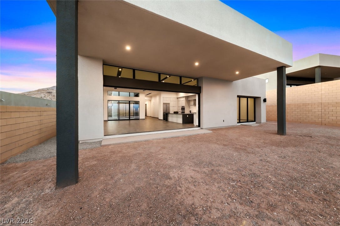 30 Sand Star Lane, Henderson, NV 89011 An expansive covered patio connects the indoor living spaces to the backyard.