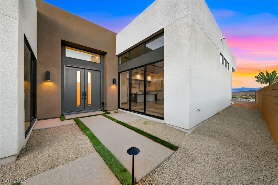 30 Sand Star Lane, Henderson, NV 89011 Bold geometric lines and smooth stucco walls define this contemporary desert entryway.