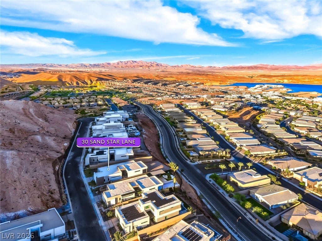 30 Sand Star Lane, Henderson, NV 89011 Dramatic desert landscapes and mountain horizons frame this masterfully planned hillside community.