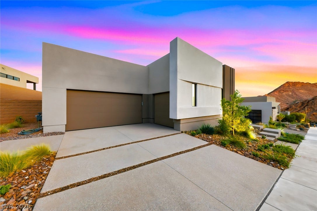 30 Sand Star Lane, Henderson, NV 89011 Striking contemporary lines define this modern exterior set against a dramatic desert backdrop.