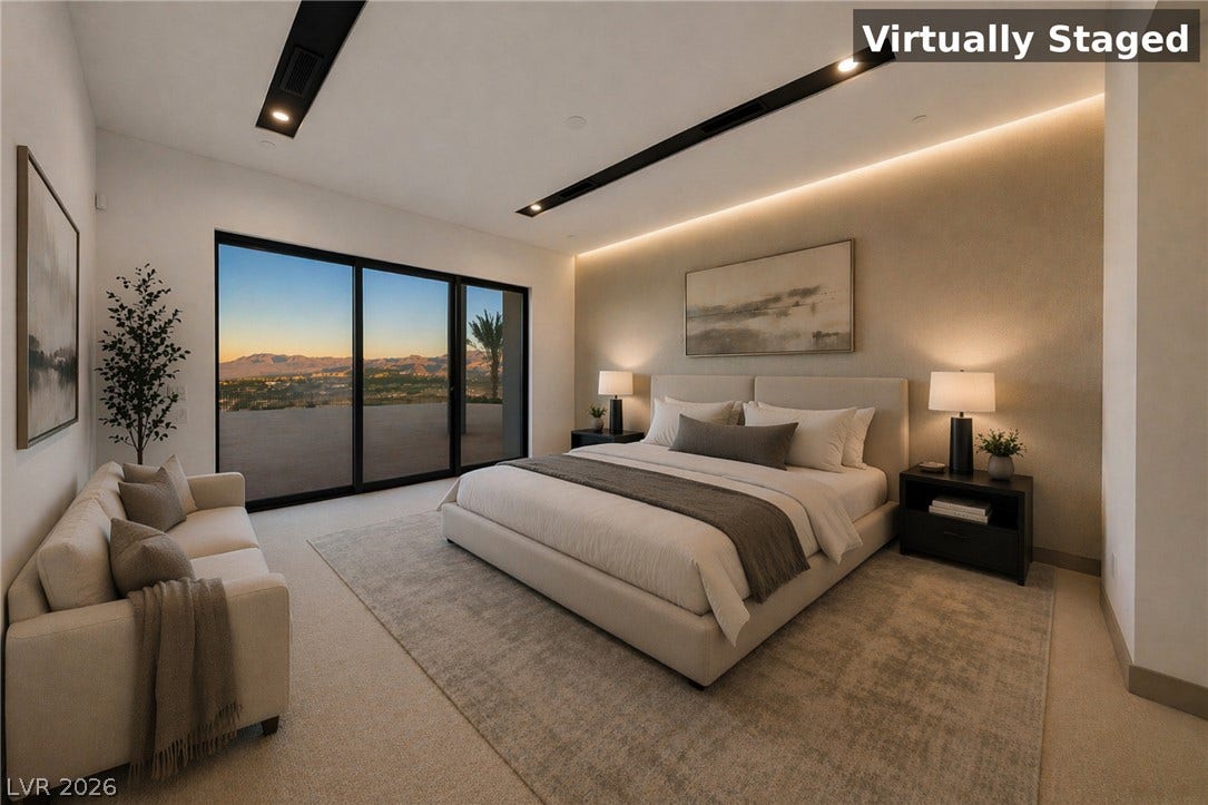 30 Sand Star Lane, Henderson, NV 89011 Sliding glass doors frame far-reaching mountain vistas in this modern bedroom suite.