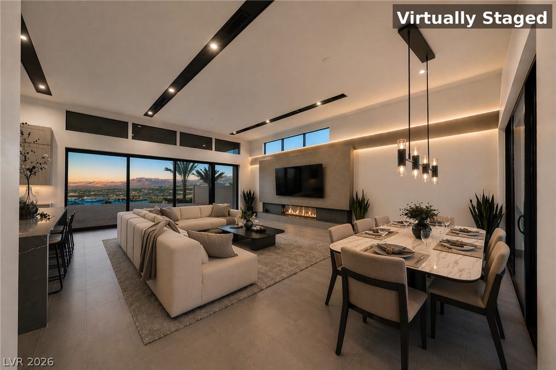 30 Sand Star Lane, Henderson, NV 89011 Clean architectural lines and custom lighting frame an airy open-concept layout with sweeping desert views.
