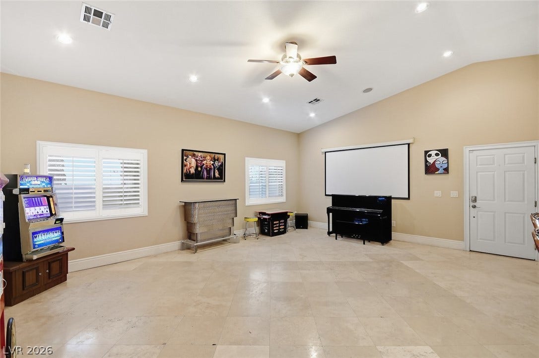 6625 W El Campo Grande Avenue, Las Vegas, NV 89130 Theater or bedroom with full bath & Wet bar.