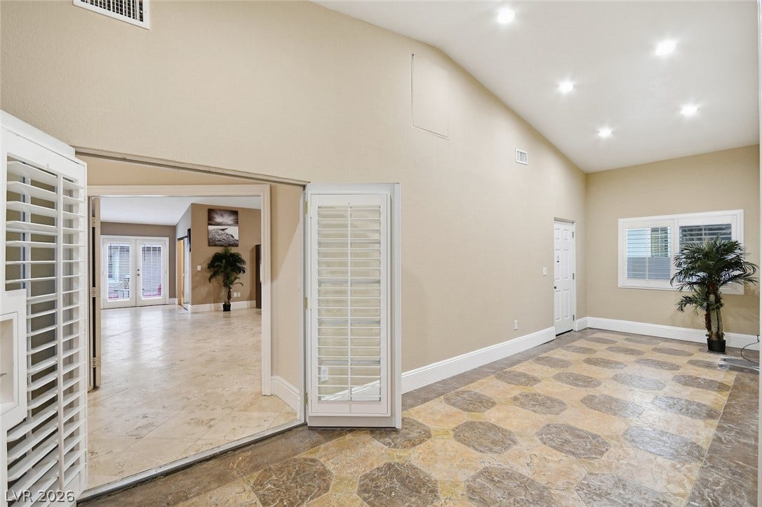 6625 W El Campo Grande Avenue, Las Vegas, NV 89130 Mud room, with backyard access.
