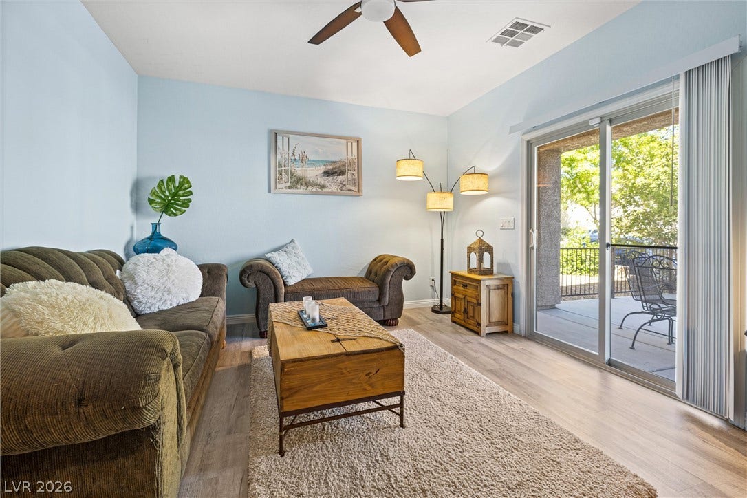 8944 Red Tapestry Court, Las Vegas, NV 89149 Sliding glass doors open from the Den area to a private outdoor patio.