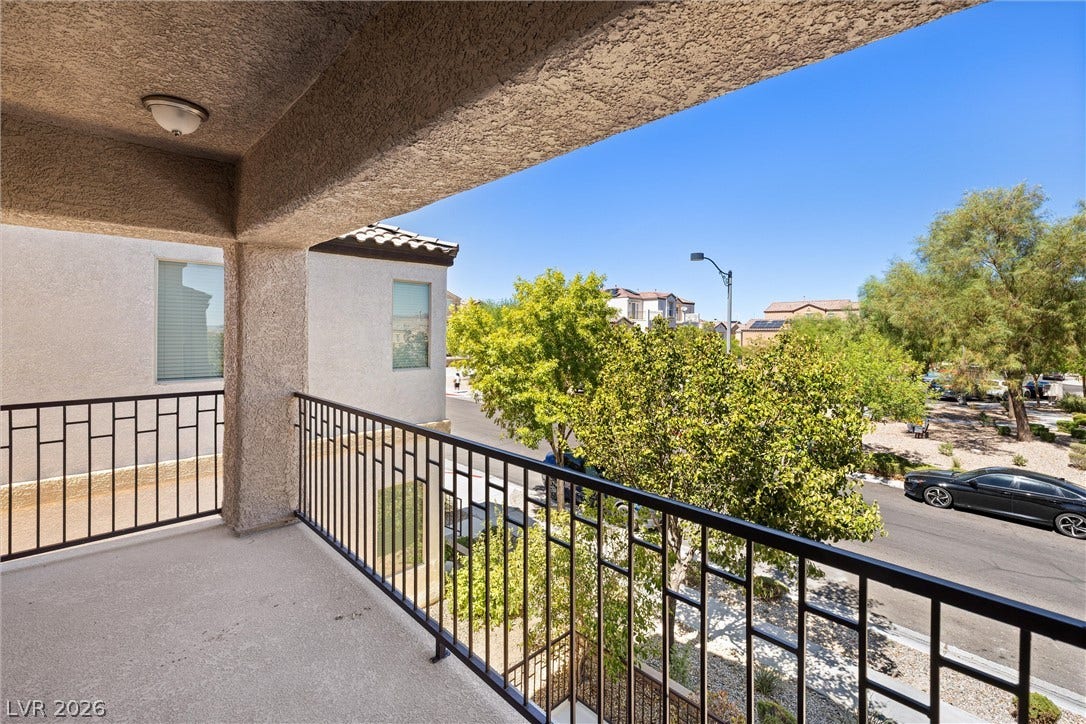 8944 Red Tapestry Court, Las Vegas, NV 89149 An elevated perspective overlooks the surrounding neighborhood from a covered outdoor space adjacent to your family room.