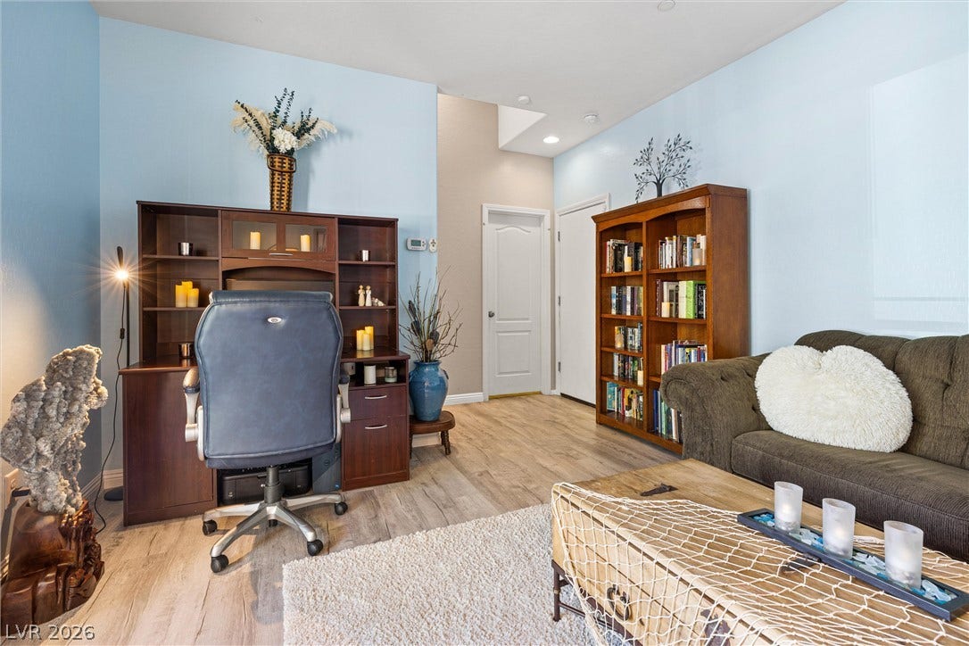 8944 Red Tapestry Court, Las Vegas, NV 89149 Private den define this versatile home workspace.