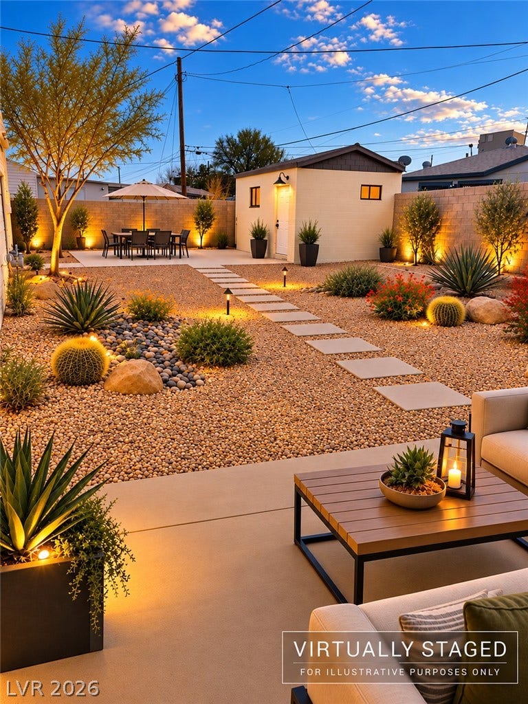 580 Karen Way, Henderson, NV 89015 Virtual Staged Photo. Artfully designed desert landscaping and concrete paver pathways create a serene outdoor oasis.