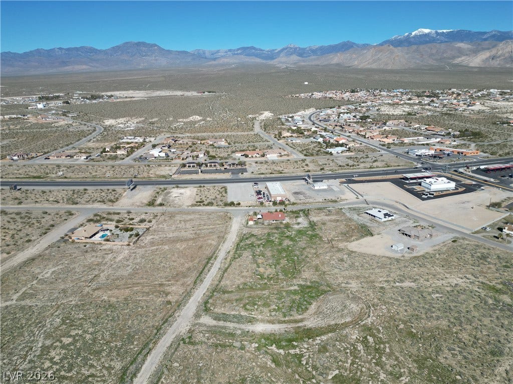 2090 S Pahrump Valley Boulevard, Pahrump, NV 89048 Majestic snow-capped mountain peaks frame this expansive high-desert landscape.