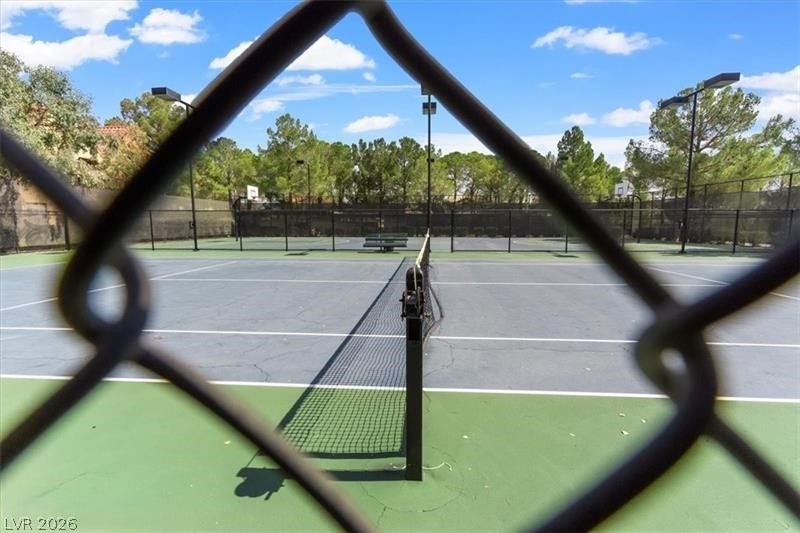 Professional outdoor courts offer space for active recreation under clear blue skies.