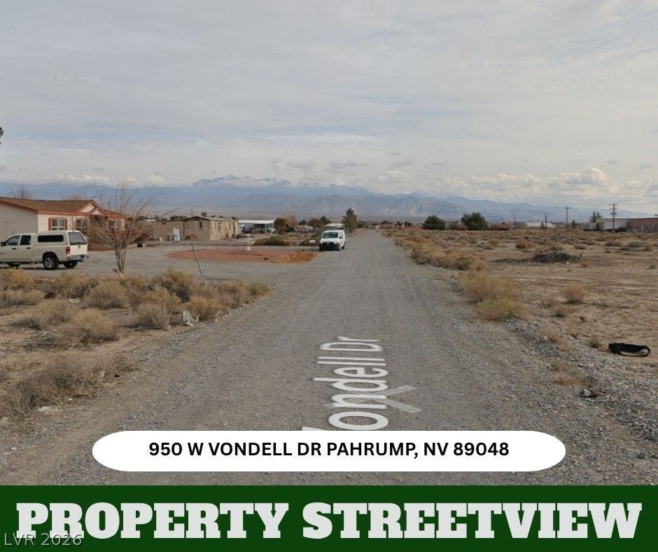 950 Vondell Drive, Pahrump, NV 89048 Majestic mountain ranges rise in the distance beyond the quiet neighborhood roadway.