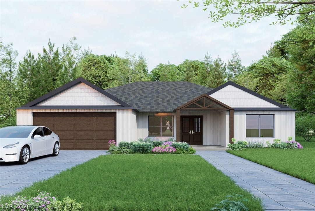 950 Vondell Drive, Pahrump, NV 89048 Crisp vertical siding paired with textured shingles defines this modern single-story residence.