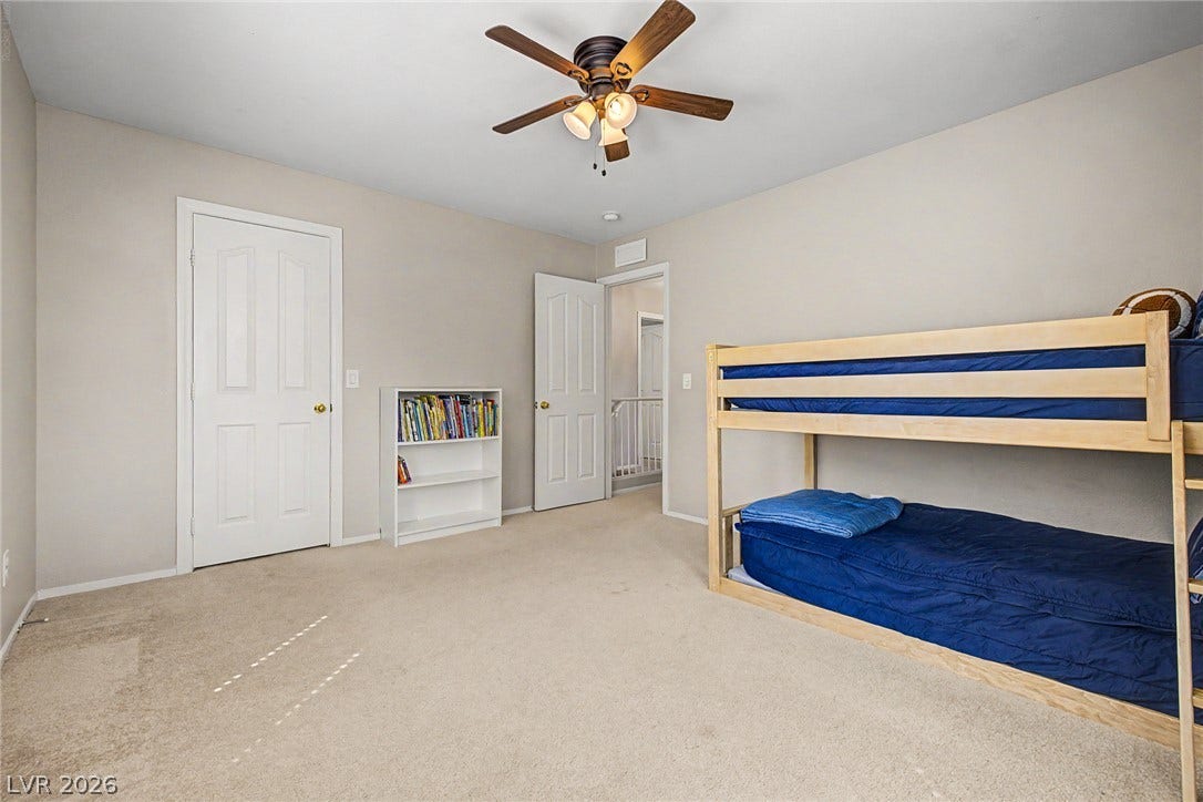 199 Winnsboro Street, Henderson, NV 89074 Neutral walls and plush carpet create a comfortable space with a classic layout.