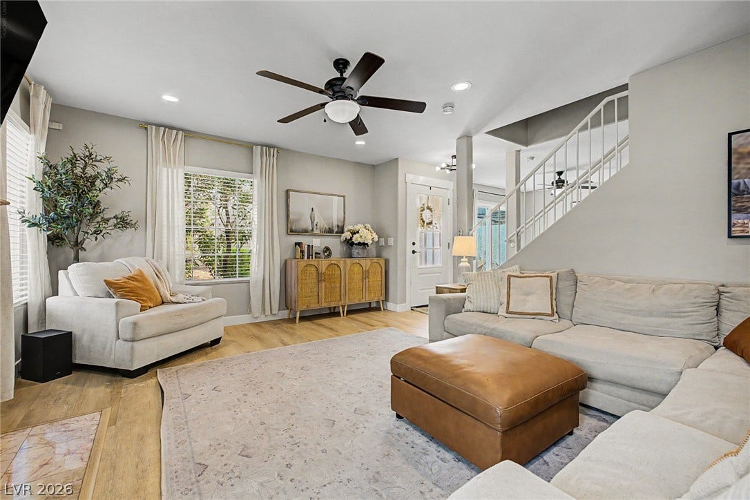 199 Winnsboro Street, Henderson, NV 89074 Warm hardwood floors and abundant natural light define this welcoming main living area.