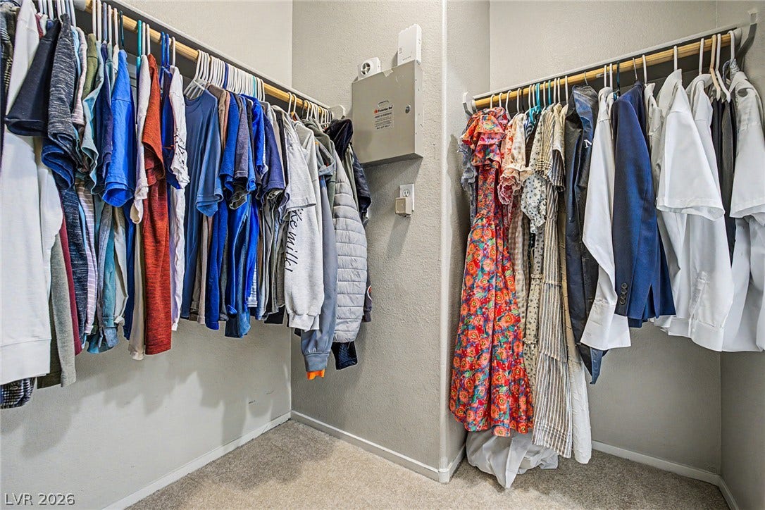 199 Winnsboro Street, Henderson, NV 89074 A spacious walk-in closet includes ample hanging space and soft carpeting.
