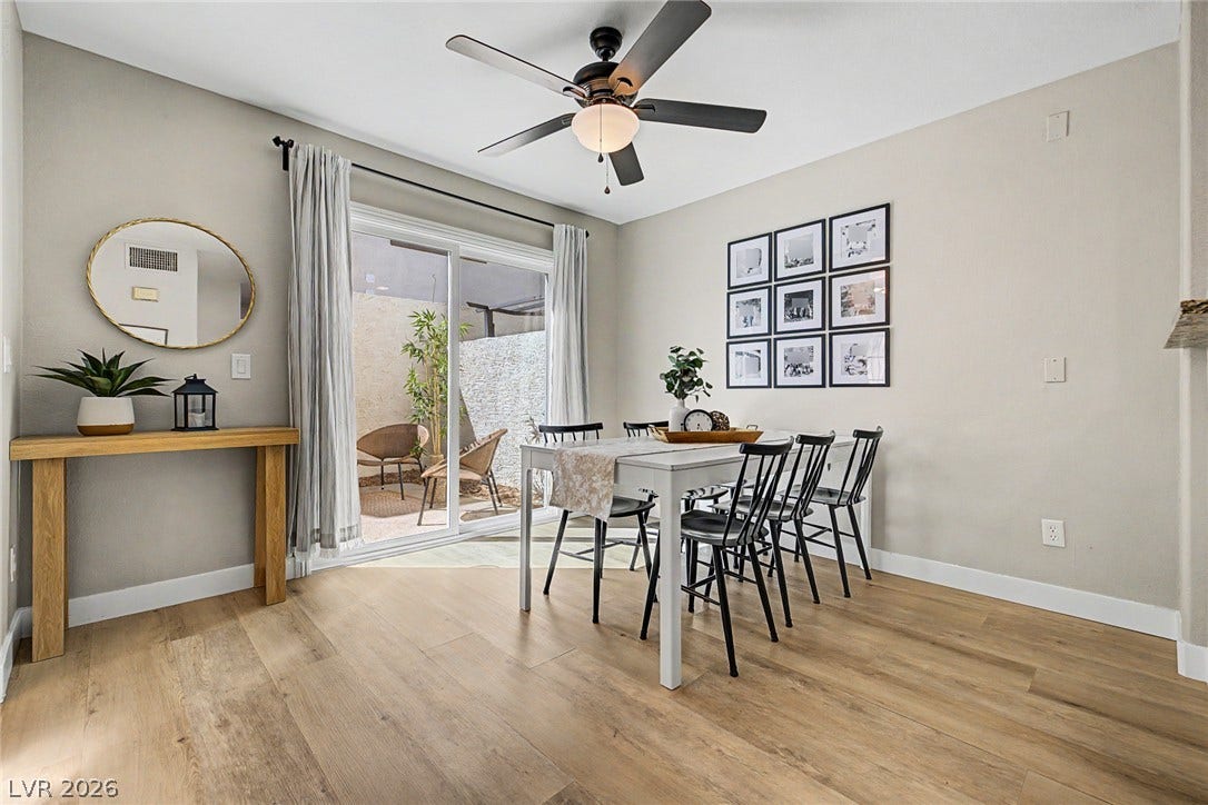 199 Winnsboro Street, Henderson, NV 89074 Sliding glass doors open from the dining space to a private outdoor patio area.