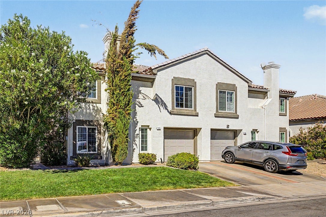 199 Winnsboro Street, Henderson, NV 89074 Stucco cladding and structured window casings elevate this classic multi-level facade.