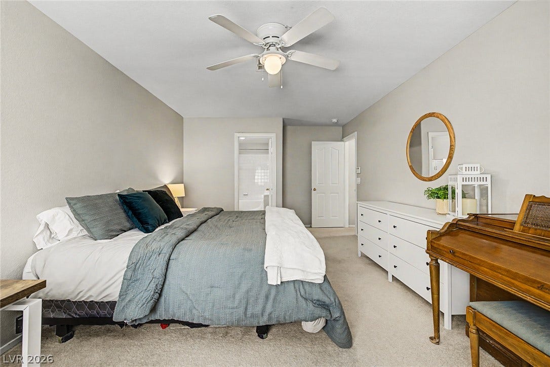 199 Winnsboro Street, Henderson, NV 89074 Smooth carpeting and crisp neutral walls create a serene and relaxing personal retreat.