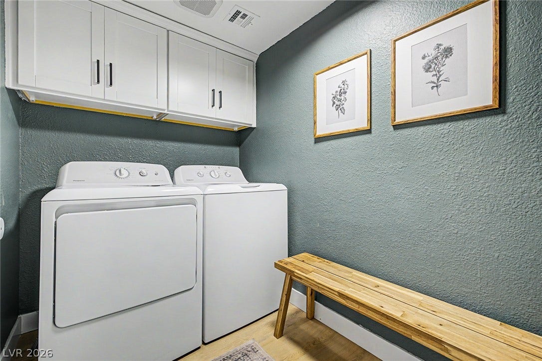 199 Winnsboro Street, Henderson, NV 89074 Ample overhead cabinetry maximizes storage in this highly functional laundry area.