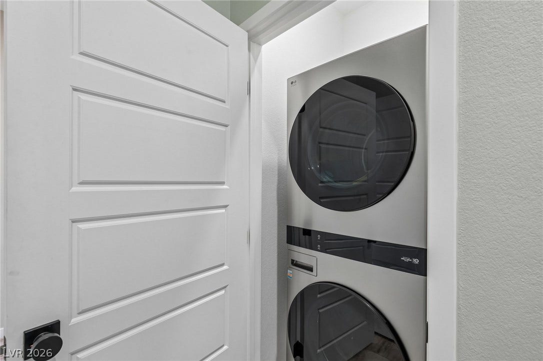 194 Viento Ridge Street, Henderson, NV 89012 A dedicated laundry closet optimizes space with efficient stacked appliances.