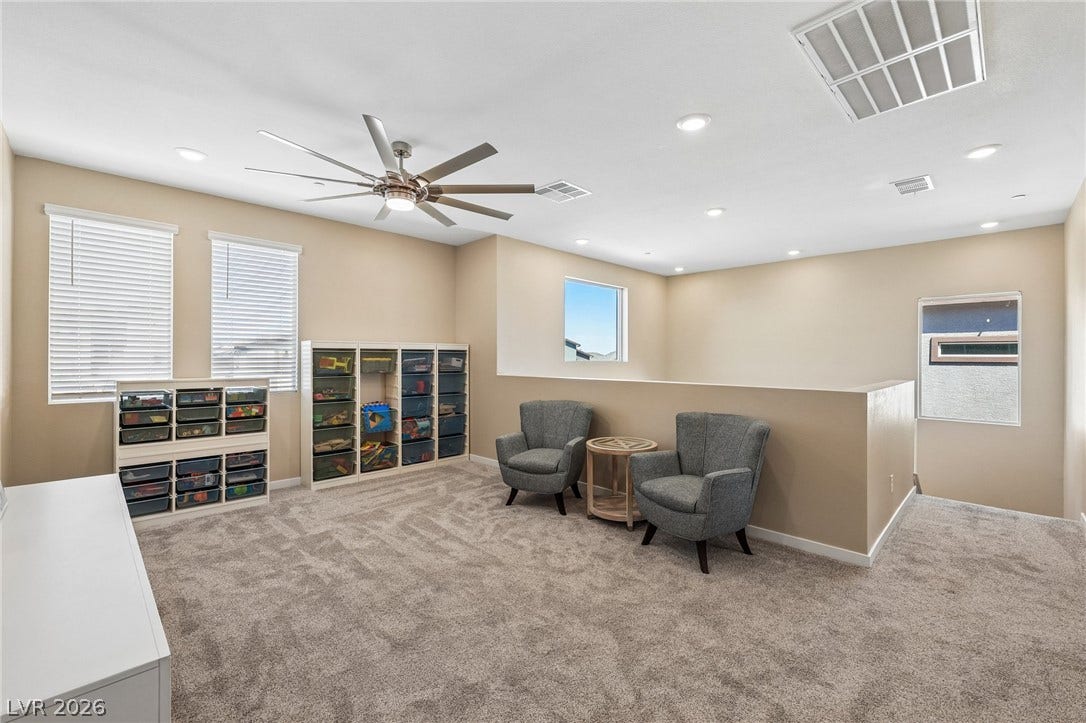 194 Viento Ridge Street, Henderson, NV 89012 Plush carpeting and integrated lighting define this versatile upper-level bonus space.