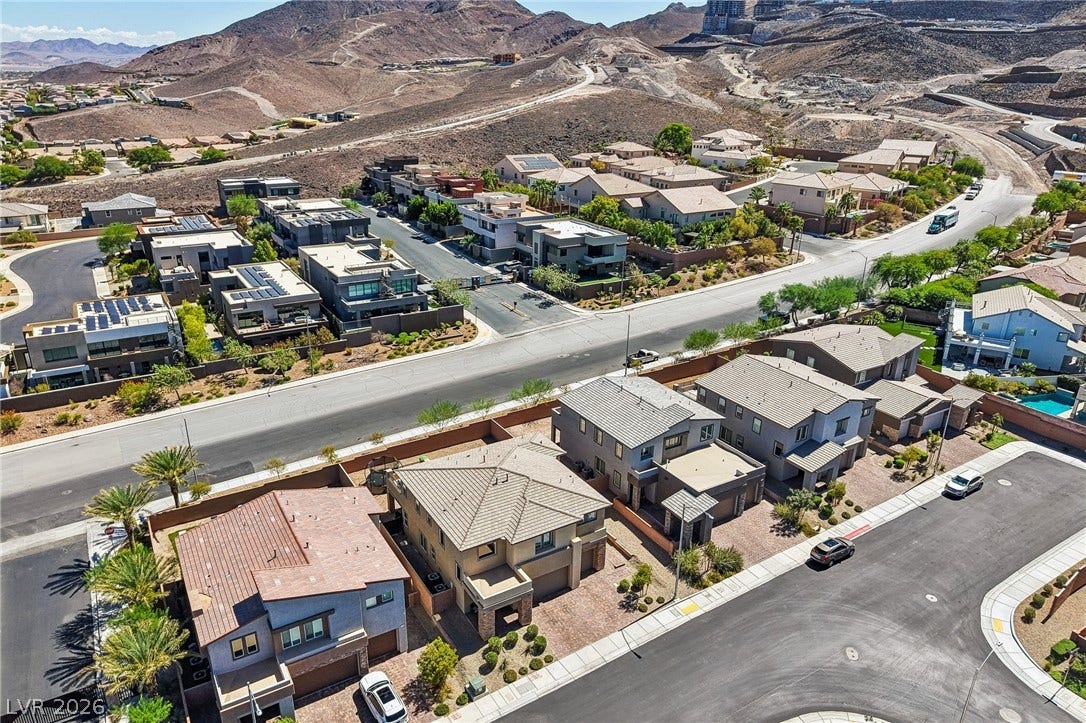 194 Viento Ridge Street, Henderson, NV 89012 Rugged desert hills rise majestically beyond this quiet residential neighborhood.