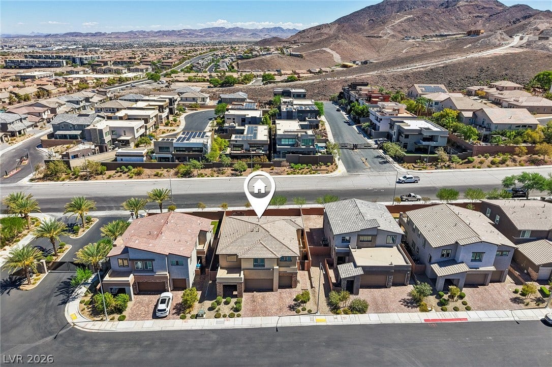 194 Viento Ridge Street, Henderson, NV 89012 Rugged mountain ridges frame this modern desert neighborhood of contemporary multi-level homes.