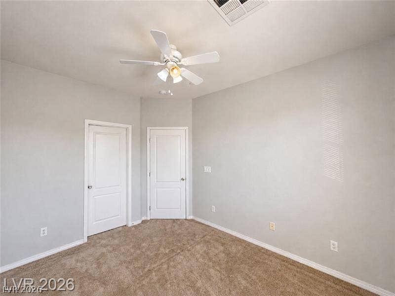 4020 Thomas Patrick Avenue, North Las Vegas, NV 89032 Neutral walls and soft carpeting create a quiet backdrop in this versatile bedroom.