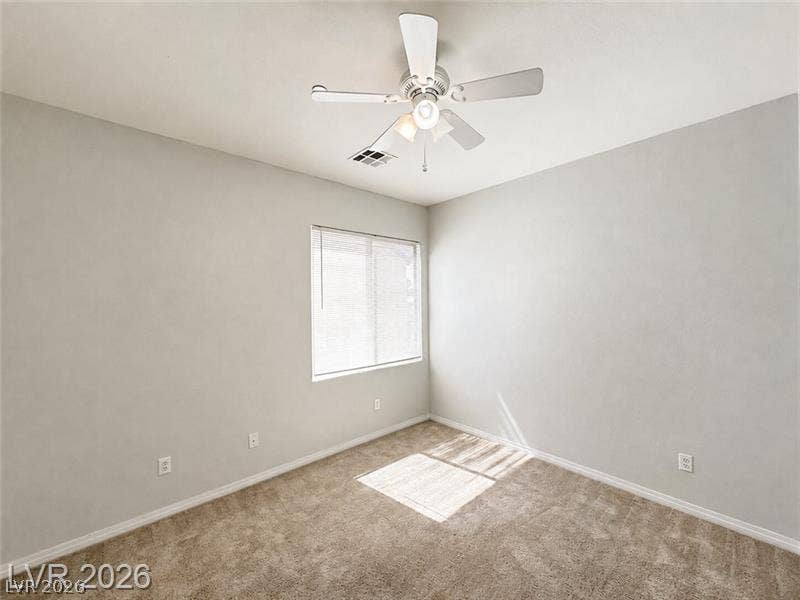 4020 Thomas Patrick Avenue, North Las Vegas, NV 89032 Plush carpeting and natural light define this versatile secondary bedroom space.