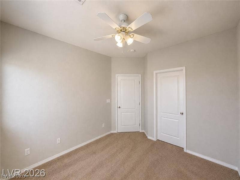 4020 Thomas Patrick Avenue, North Las Vegas, NV 89032 Plush carpet flooring underfoot anchors this versatile room option.