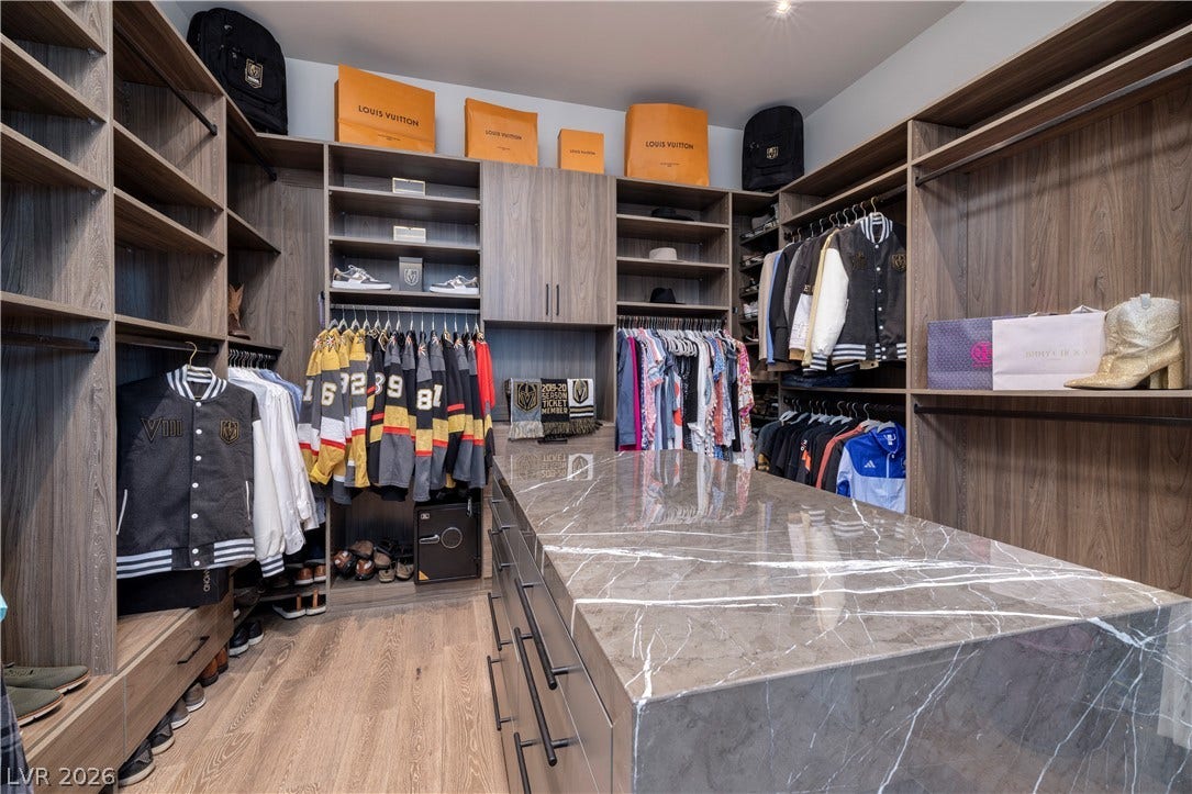 10 Sunrise Beach Circle, Henderson, NV 89011 Primary custom closet with island and Washer/Dryer