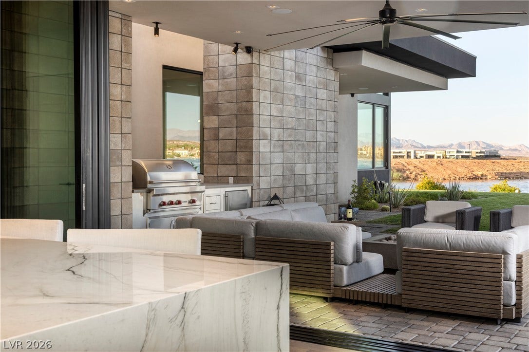 10 Sunrise Beach Circle, Henderson, NV 89011 Sliding glass walls bring the outside in with wolf BBQ and frig
