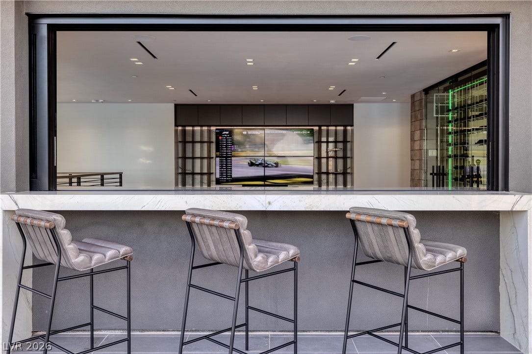 10 Sunrise Beach Circle, Henderson, NV 89011 Upstairs Loft and Balcony with retractable sliding window at the bar.