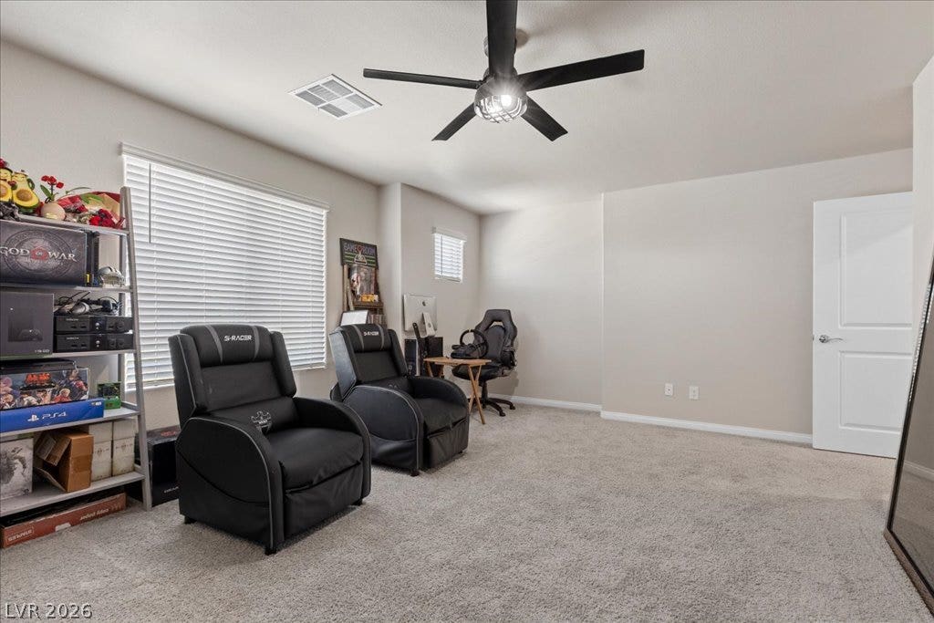 A versatile bonus room offers ample space for recreation or quiet study, anchored by plush carpeting.