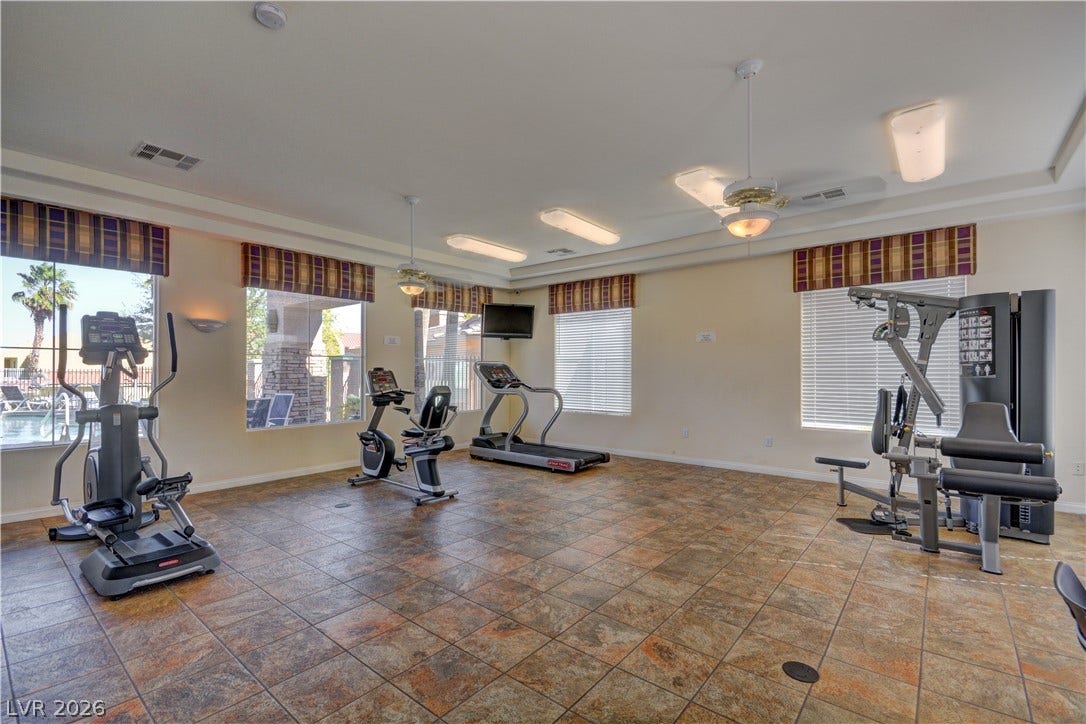 207 Kaelyn Street, #5, Boulder City, NV 89005 Durable tile flooring and generous window views define this functional community fitness center.