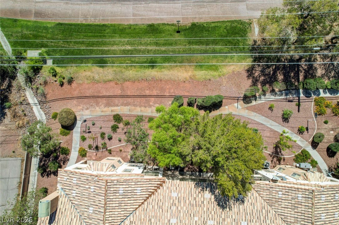 207 Kaelyn Street, #5, Boulder City, NV 89005 An aerial perspective showcases the tiled rooflines and landscaped walking paths bordering the property.