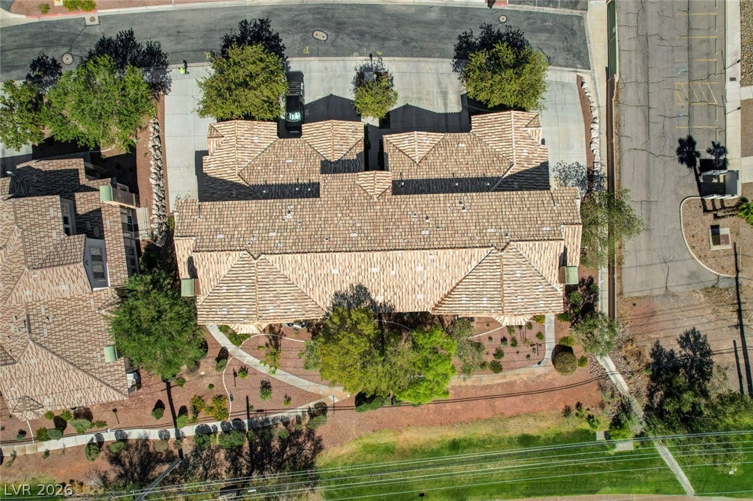 207 Kaelyn Street, #5, Boulder City, NV 89005 An overhead perspective reveals the distinct tile roofline and landscaped pathways of this property.