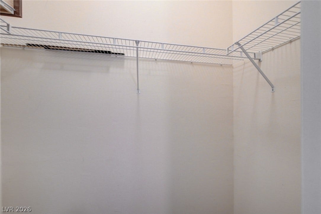 207 Kaelyn Street, #5, Boulder City, NV 89005 Functional wire shelving wraps around the walls of this storage area.