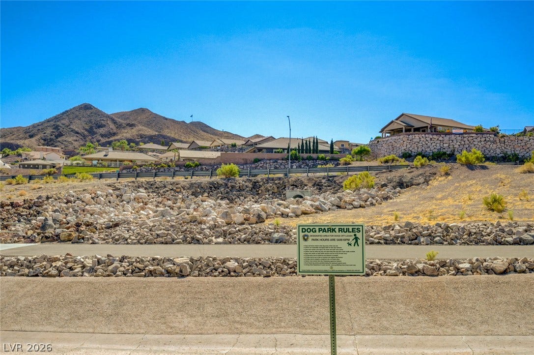207 Kaelyn Street, #5, Boulder City, NV 89005 A local neighborhood park features rocky terrain set against a majestic mountain backdrop.