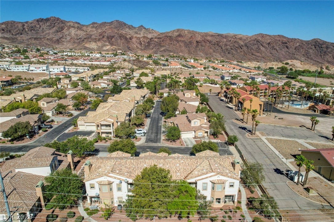 207 Kaelyn Street, #5, Boulder City, NV 89005 Nestled near towering desert peaks, this residential community offers a peaceful neighborhood setting.