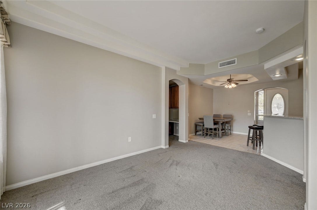 207 Kaelyn Street, #5, Boulder City, NV 89005 An open floor plan connects the comfortable living area to the adjacent dining space.