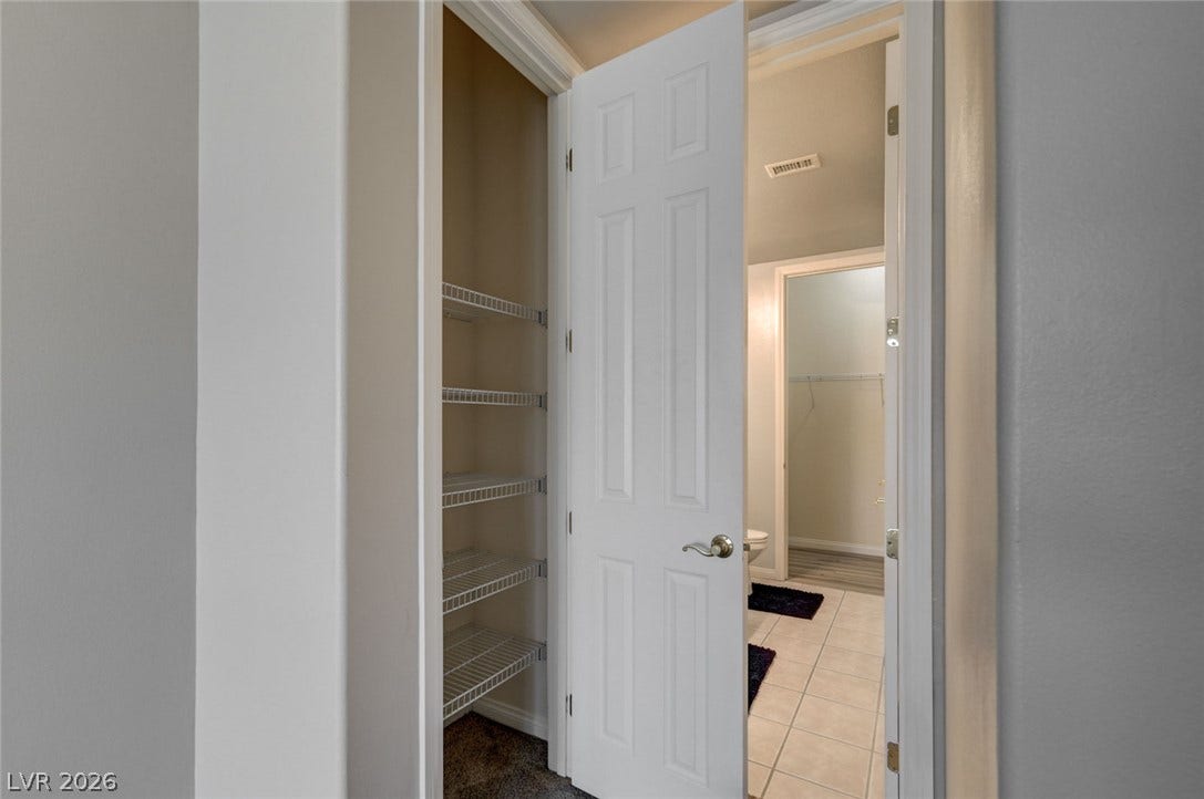 207 Kaelyn Street, #5, Boulder City, NV 89005 Functional storage and adjacent spaces are thoughtfully laid out with multiple tile-floored entryways.