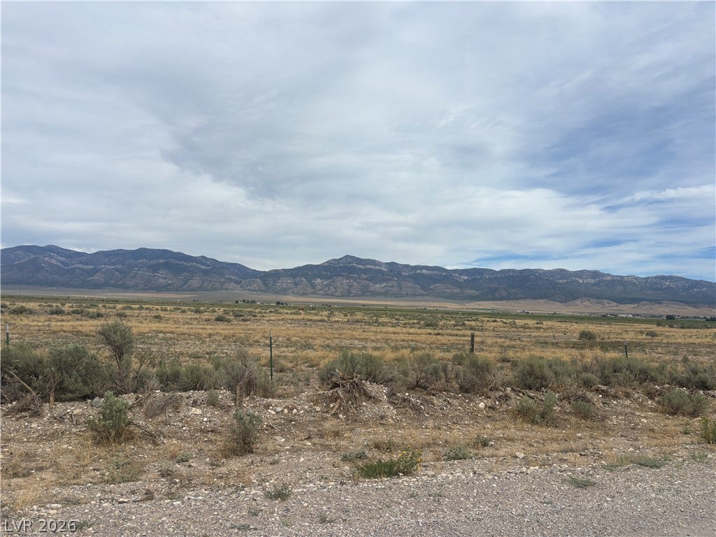 Preston Dump Road, Ely, NV 89301 Dramatic mountain ranges frame the horizon of this vast, open property.
