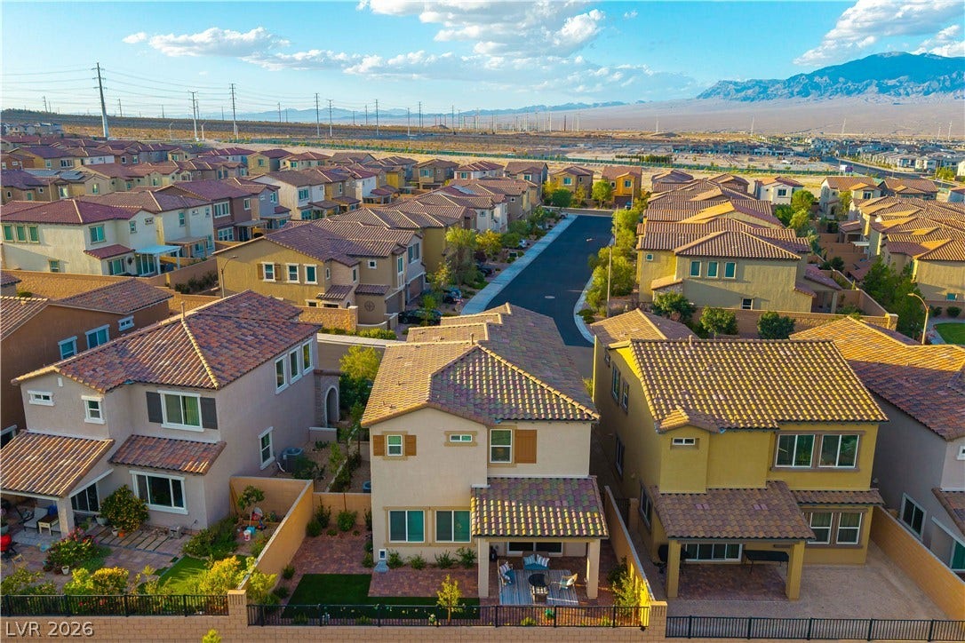 10583 Valletta Avenue, Las Vegas, NV 89166 Tiled roofs and stucco exteriors define this quiet neighborhood nestled near majestic desert mountains.