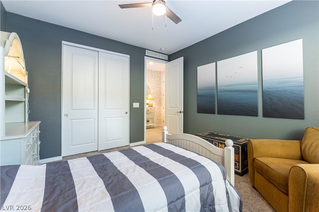 10583 Valletta Avenue, Las Vegas, NV 89166 Plush carpeting and custom sliding doors define this cozy private retreat.