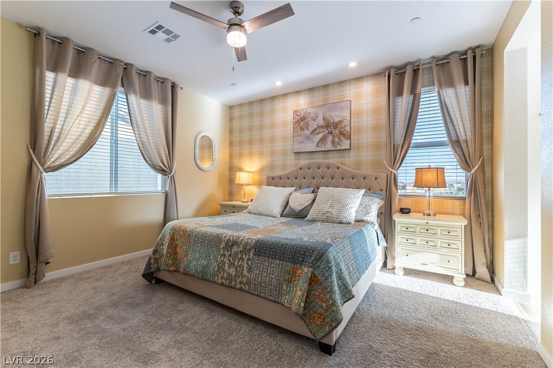 10583 Valletta Avenue, Las Vegas, NV 89166 A tranquil sleeping space featuring plush wall-to-wall carpeting and recessed lighting.
