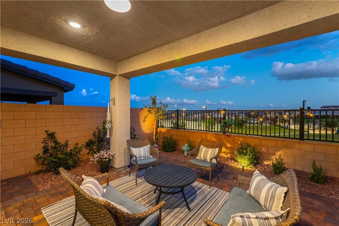 10583 Valletta Avenue, Las Vegas, NV 89166 An inviting covered patio offers brick pavers and expansive views of the adjacent park.
