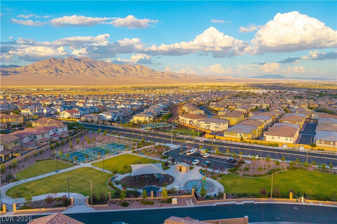 10583 Valletta Avenue, Las Vegas, NV 89166 Breathtaking mountain and valley views frame this vibrant community setting with parks and sports courts.