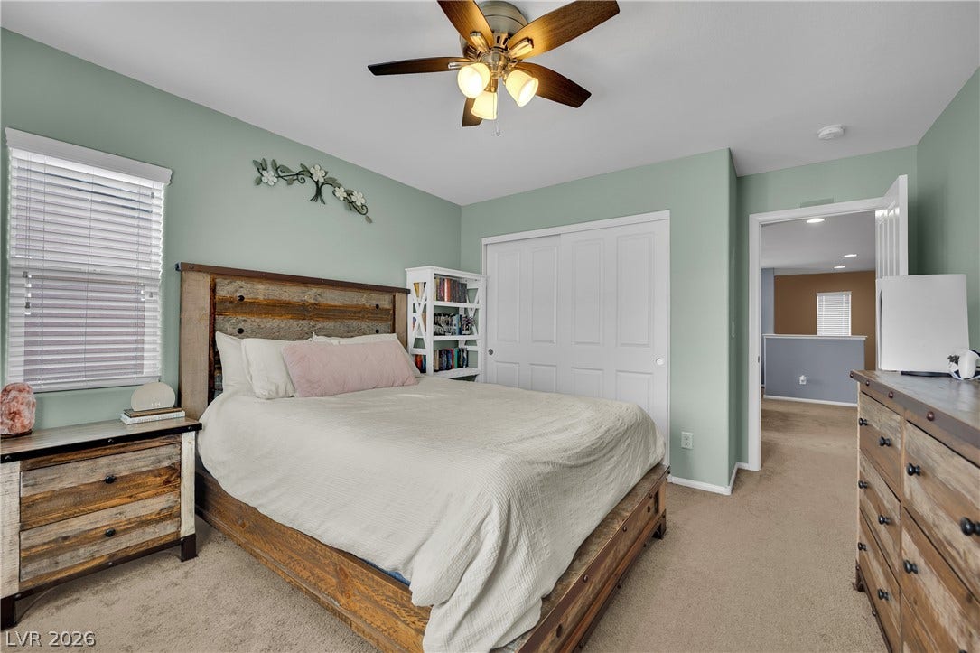 1421 Lamance Court, North Las Vegas, NV 89031 Smooth plaster finishes pair with plush carpeting underfoot in this cozy upper level sanctuary.