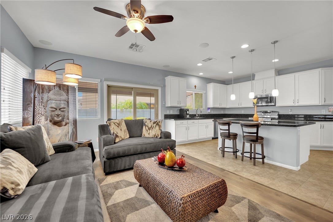 1421 Lamance Court, North Las Vegas, NV 89031 An open floorplan seamlessly connects the comfortable living area directly into the modern kitchen.